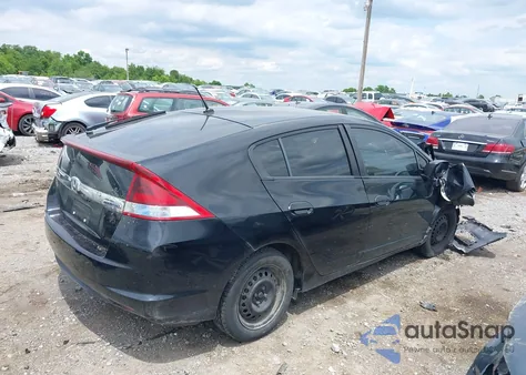 2012 Honda Insight from USA, damaged, VIN JHMZE2H36CS000448